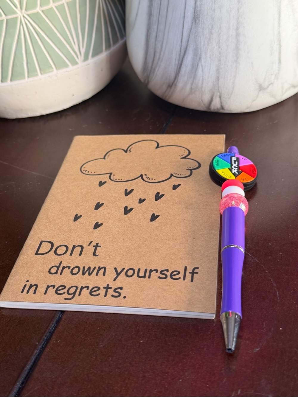 Kraft Notebook/ journal Quote ‘Don’t drown yourself in regrets’. And pen